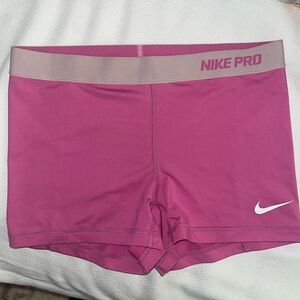 Women’s pink Nike Pro shorts
